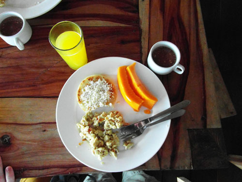 Typical Colombian breakfast: fruit, egg, arepa Typical Colombian breakfast: fruit, egg, arepa